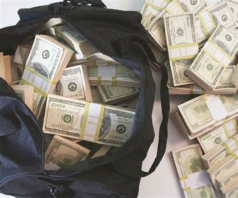 duffle bag of fake money|blue duffel bag with money.